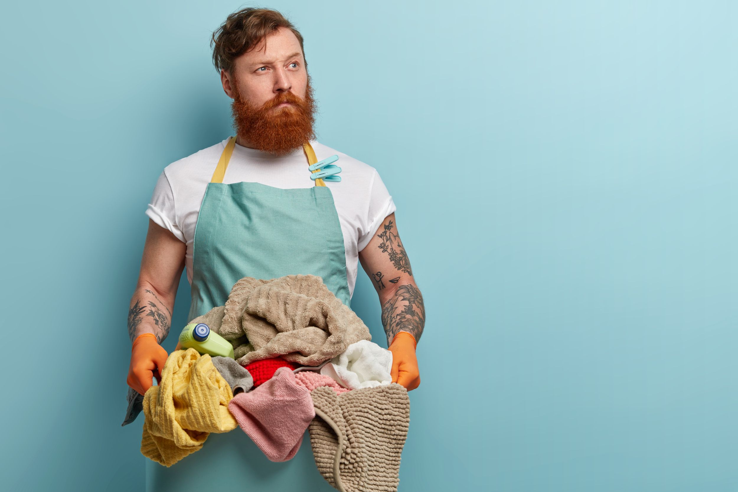 Laundry Man Shutterstock 1361559728